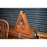 An interesting vintage cuckoo clock, probably Russian, of triangular form , having double pine