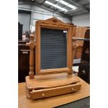 A modern pine dressing table mirror having drawer base, width approx. 51cm