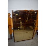 A vintage smoked mirror, 62 x 93cm