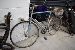 A vintage Peugeot gents bike, numbered 103