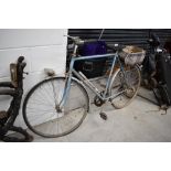 A vintage Peugeot gents bike, numbered 103