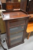 A Victorian rosewood mahogany music cabinet