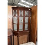 A late 19th/early 20th Century Art Nouveau mahogany display cabinet the glazed upper section with