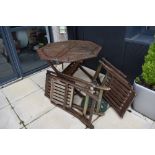A wooden garden table and chairs etc