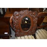 A 19th Century carved oak mirror, width approx. 45cm