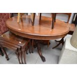 A Victorian mahogany loo style dining table on carved quadruple splay legs, width approx. 130cm