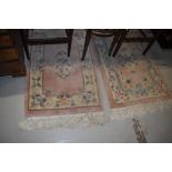 Two modern Chinese rugs, approx. 100cm x 60cm each (not including tassles)