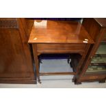 An Edwardian mahogany side table/trolley having line inlay decoration and frieze drawer, width