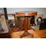 A William IV rosewood circular occasional table on tapering octagonal pillar and platform base and