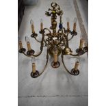 A vintage brass electroleir light fitting