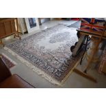 A large traditional carpet square, approx 325 x 230cm