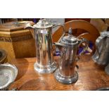 Two communion service or similar silver plated lidded jugs