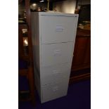 A modern grey 4 drawer filing cabinet
