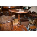 A 19th Century mahogany oval occasional table, on turned column and triple splay legs, width approx.