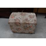 A vintage dome top bedding box, containing a good quantity of vintage fabrics in various designs