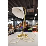 A brass desk or table lamp