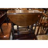 A nice quality traditional oak gate leg table, having bobbin turned legs, good proportions being