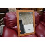 A vintage oak framed wall mirror approx. 49 x 65cm