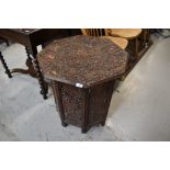 An Arts and Crafts carved folding table, really detailed foliate carving, diameter approx. 62cm