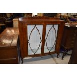 A mid 20th Century mahogany display, width approx. 120cm
