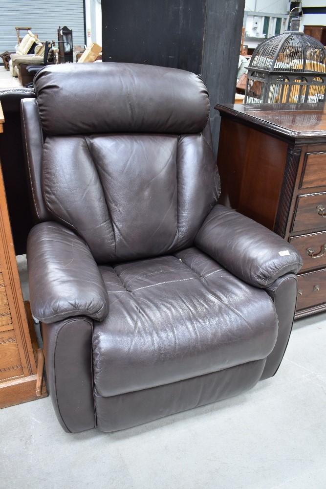 A modern brown leather La-Z-Boy rocking recliner