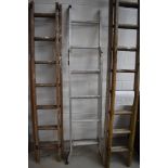 A set of aluminium extending ladders