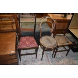 An early 20th Century bentwood chair and two Edwardian bedroom chairs