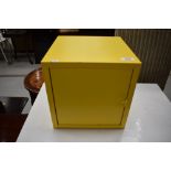 A small yellow cabinet cube, 25cm