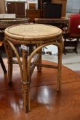 A vintage wicker side table, circumference approx. 32cm
