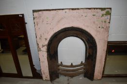 A cast iron fireplace, approx. dimensions 88 x 102cm