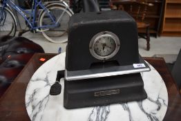 A vintage International time recorder clock