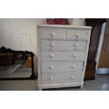 A 19th Century pine painted chest of two over three drawers, splits into two between drawer one