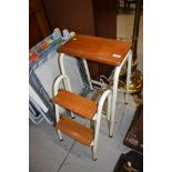 A vintage folding step stool