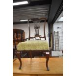 A late 19th/early 20th Century upholstered salon/bedroom chair