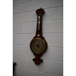 A flame mahogany banjo barometer by Knott & Co, Liverpool