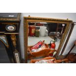 A modern gilt effect wall mirror, approx. 105 x 71cm