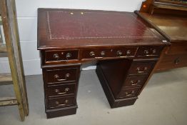 A reproduction pedestal desk , of small proportions, approx. width 94cm depth 58cm