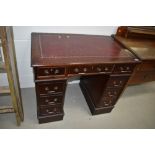 A reproduction pedestal desk , of small proportions, approx. width 94cm depth 58cm