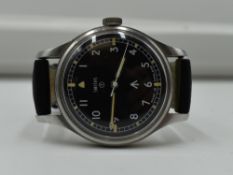 A Smiths Military Steele Wrist Watch having black face and Military Arrow Made In England, on