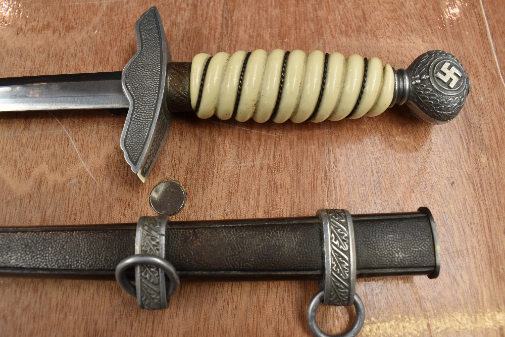 A German Luftwaffe Dagger c1937 with plastic and silver wire grip, pommel decorated with oak leaf - Image 4 of 7