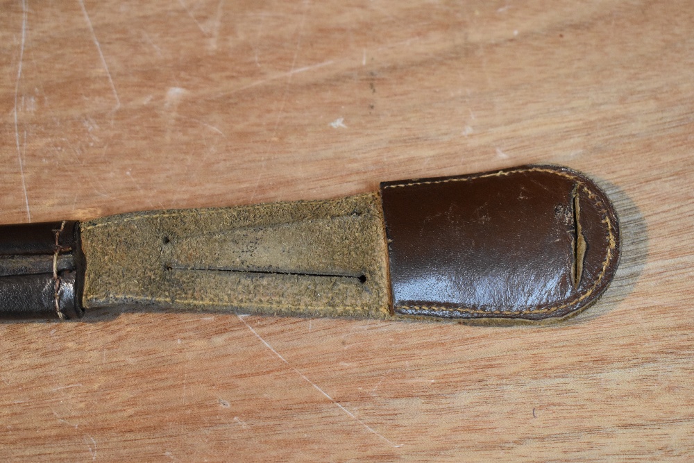 A German Third Reich Hitler Youth Dagger having black chequered grip with enamelled swastika emblem, - Image 8 of 9