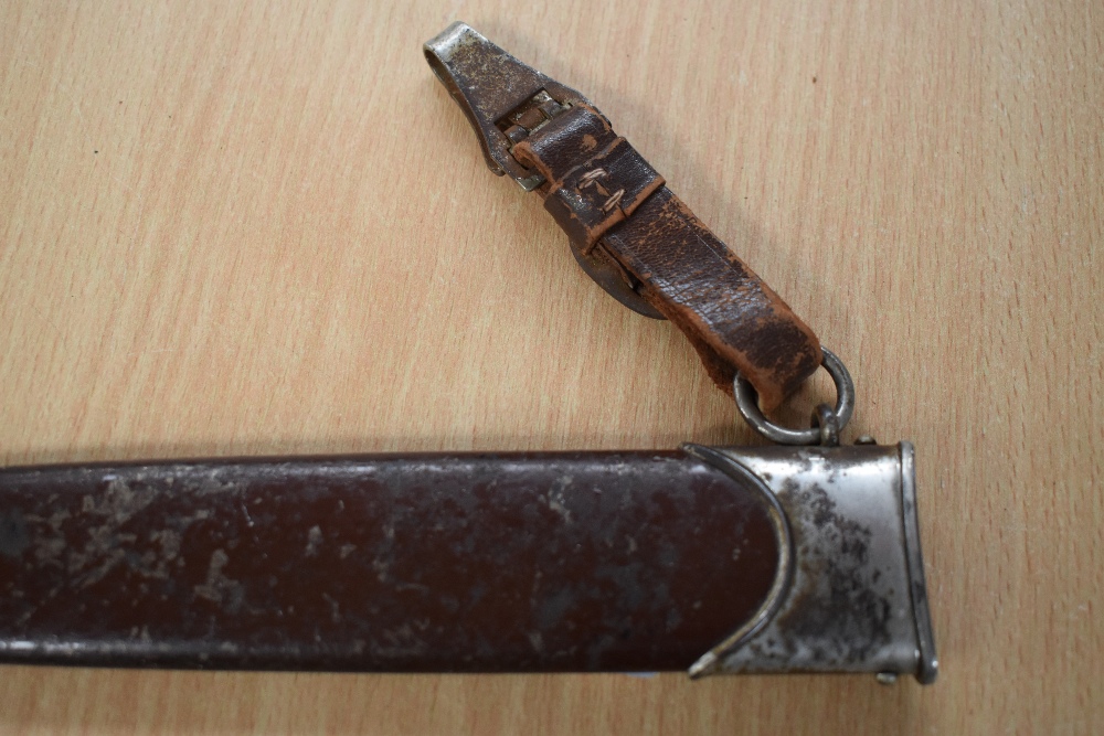 A German SA Service Dagger c1933 with metal scabbard, grip with National Socialist Emblem and SA - Image 4 of 9