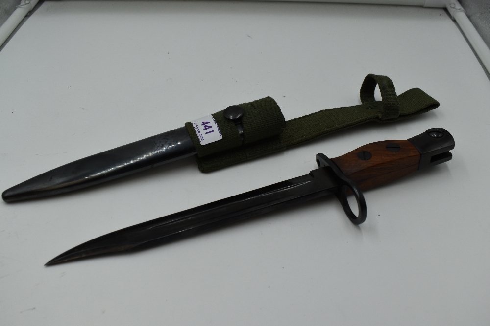 A British Issue No5 Knife Bayonet, to fit the Jungle carbine, blade marked RFI, blade length 20cm,
