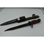 A British Issue No5 Knife Bayonet, to fit the Jungle carbine, blade marked RFI, blade length 20cm,