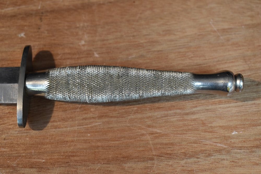 A German Third Reich Hitler Youth Dagger having black chequered grip with enamelled swastika emblem, - Image 4 of 9