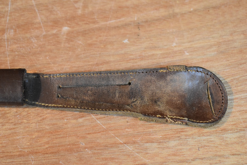 A German Third Reich Hitler Youth Dagger having black chequered grip with enamelled swastika emblem, - Image 6 of 9