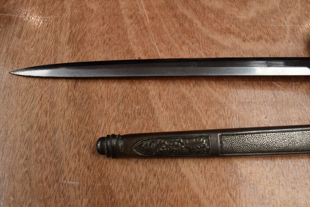 A German Luftwaffe Dagger c1937 with plastic and silver wire grip, pommel decorated with oak leaf - Image 3 of 7