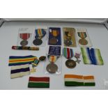 A Collection of WW1 and WW2 Medals including Belgium, Italy, Japan along with extra ribbons