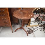 An early 19th Century mahogany pedestal table on oak tripod base