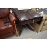 A 19th Century stained frame table, having drop flap, frieze drawer, on turned pedestal over